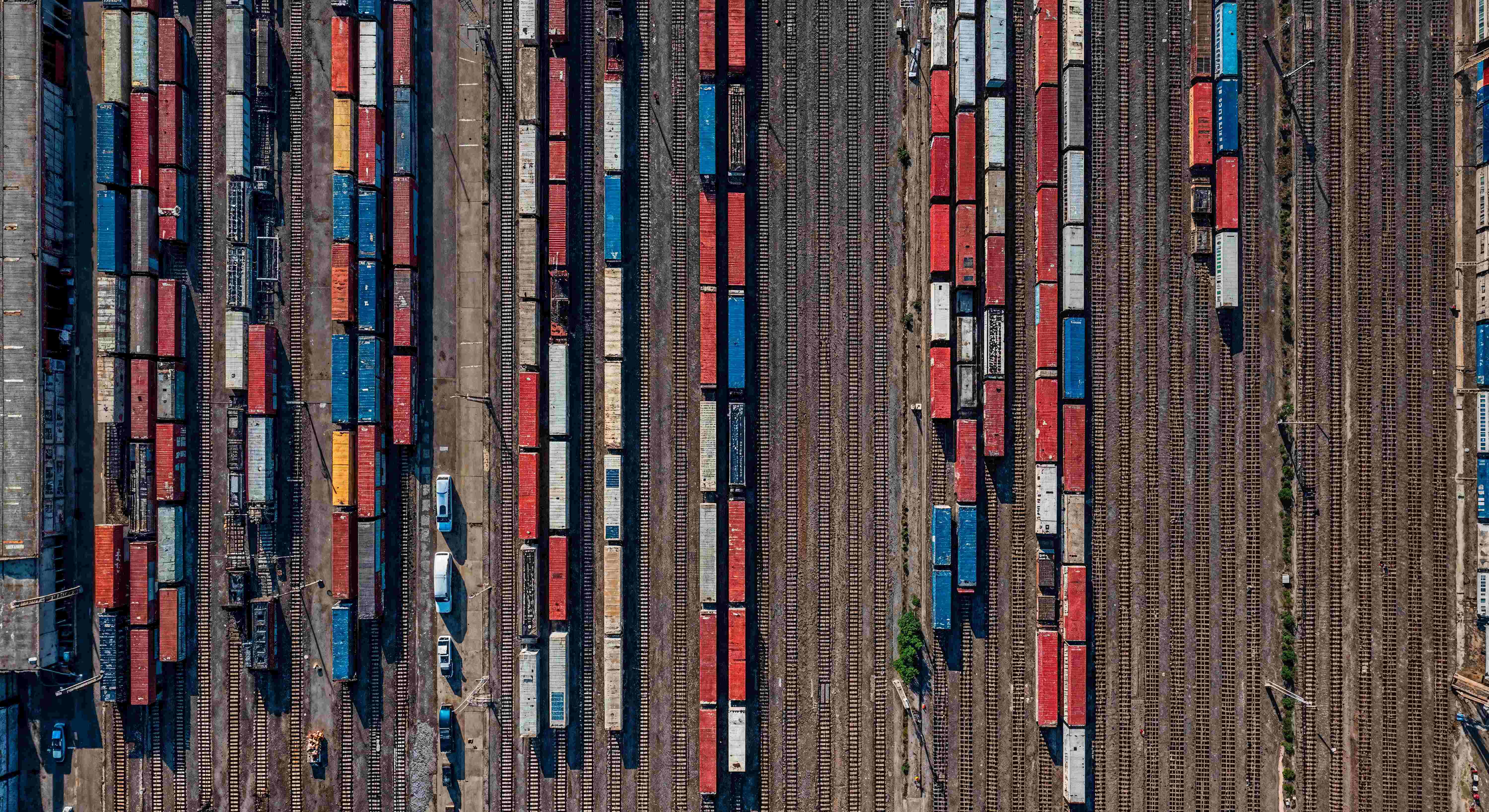 aerial view rail yard with numerous cargo trains.jpg